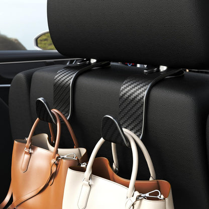 Amooca 4-Pack Car Headrest Hooks Vehicle Storage Organizer for Purses Handbags Groceries Backpack Coats –Holds 55lbs 360° Rotating Black