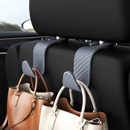 Amooca 4-Pack Car Headrest Hooks Vehicle Storage Organizer for Purses Handbags Groceries Backpack Coats –Holds 55lbs 360° Rotating Black