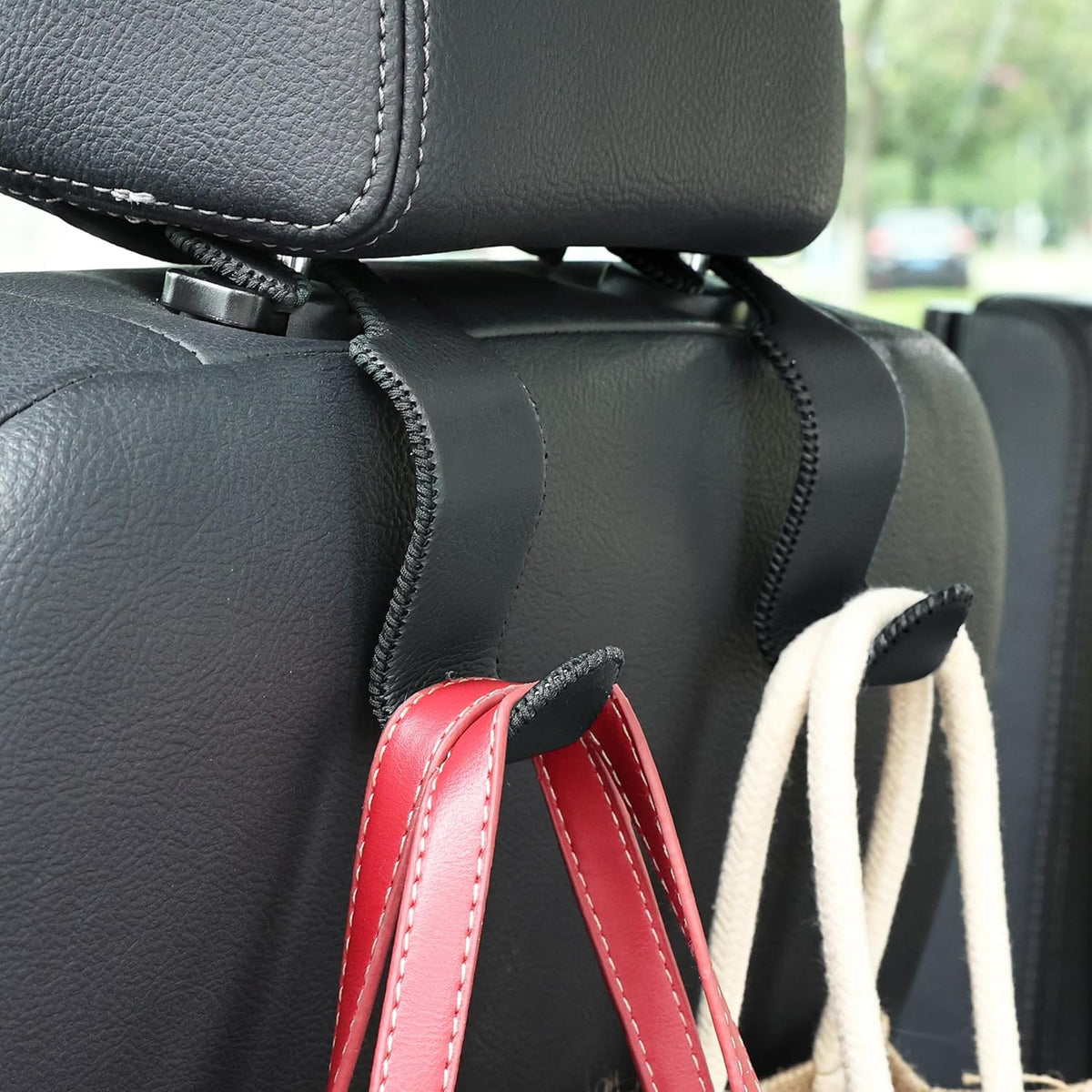 Amooca 4-Pack Car Headrest Hooks Vehicle Storage Organizer for Purses Handbags Groceries Backpack Coats –Holds 55lbs 360° Rotating Black